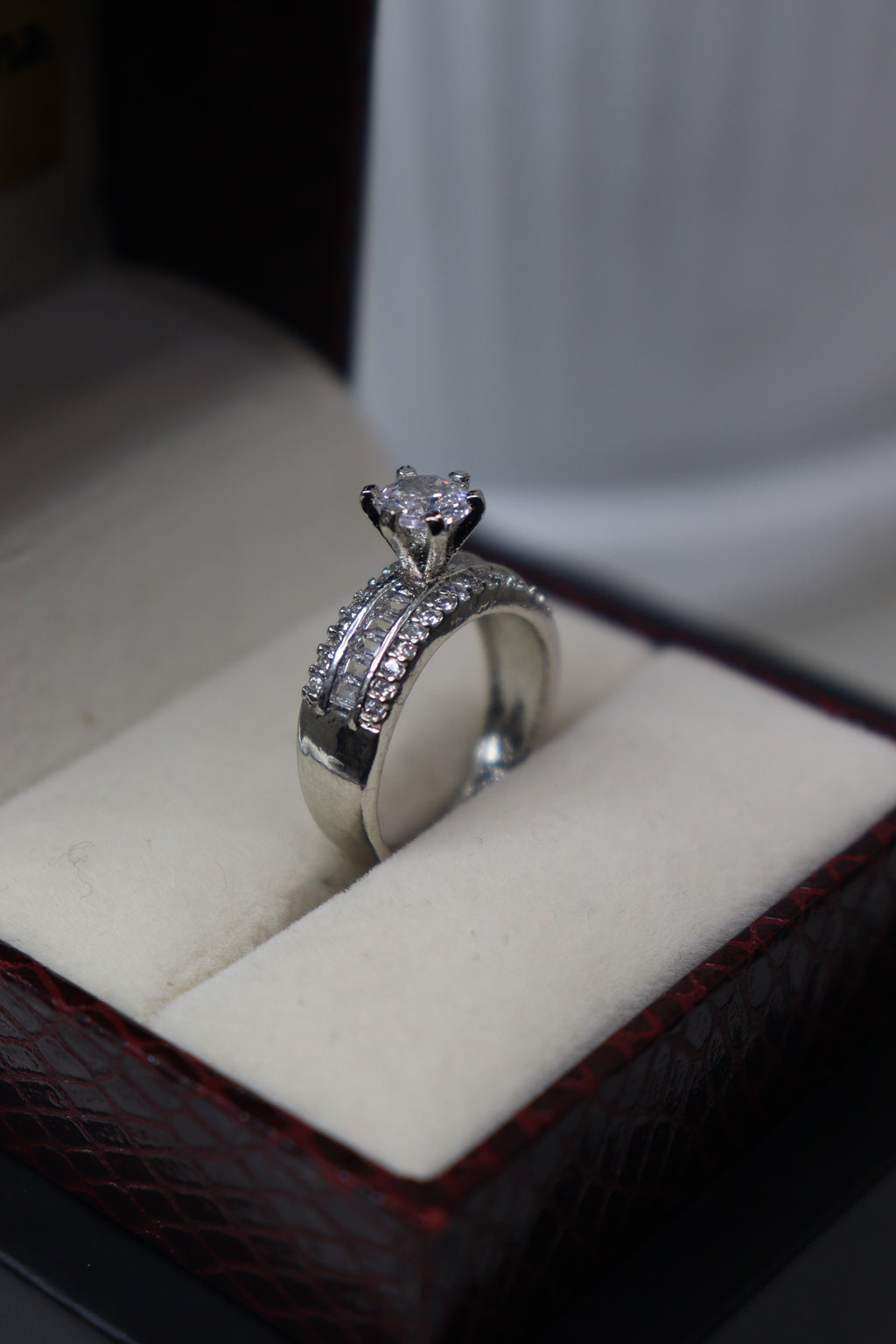 Sovereign Halo Emerald Ring
