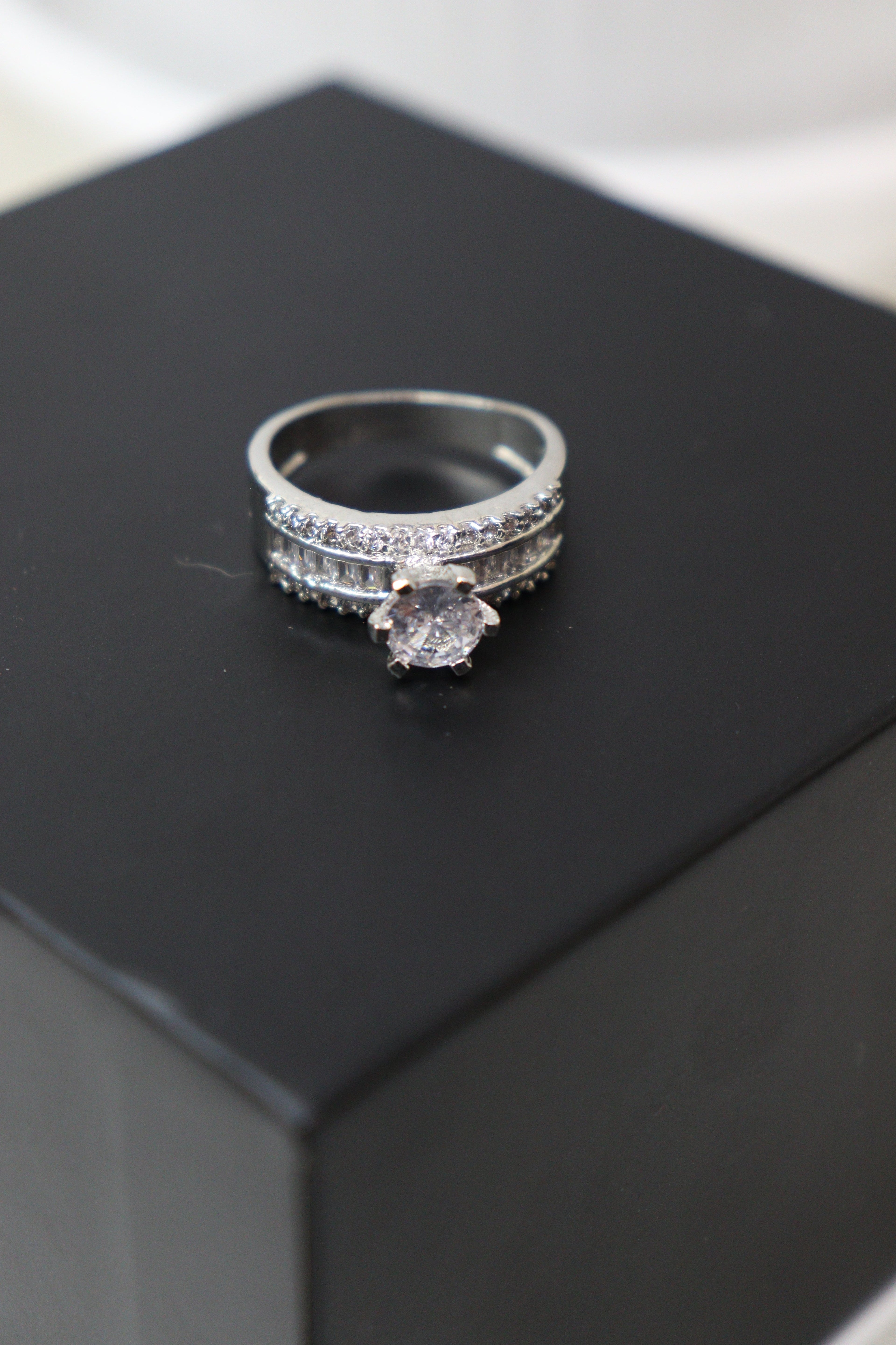 Sovereign Halo Emerald Ring